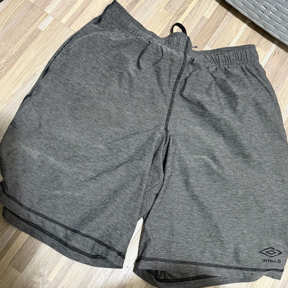 Men’s size, large umbro  gray drawstring shorts T22